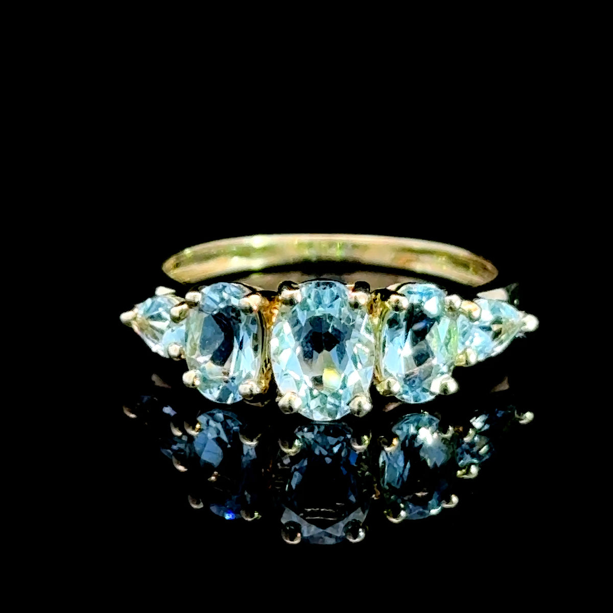 9K Yellow Gold 5 Stone Light Blue Topaz Ring