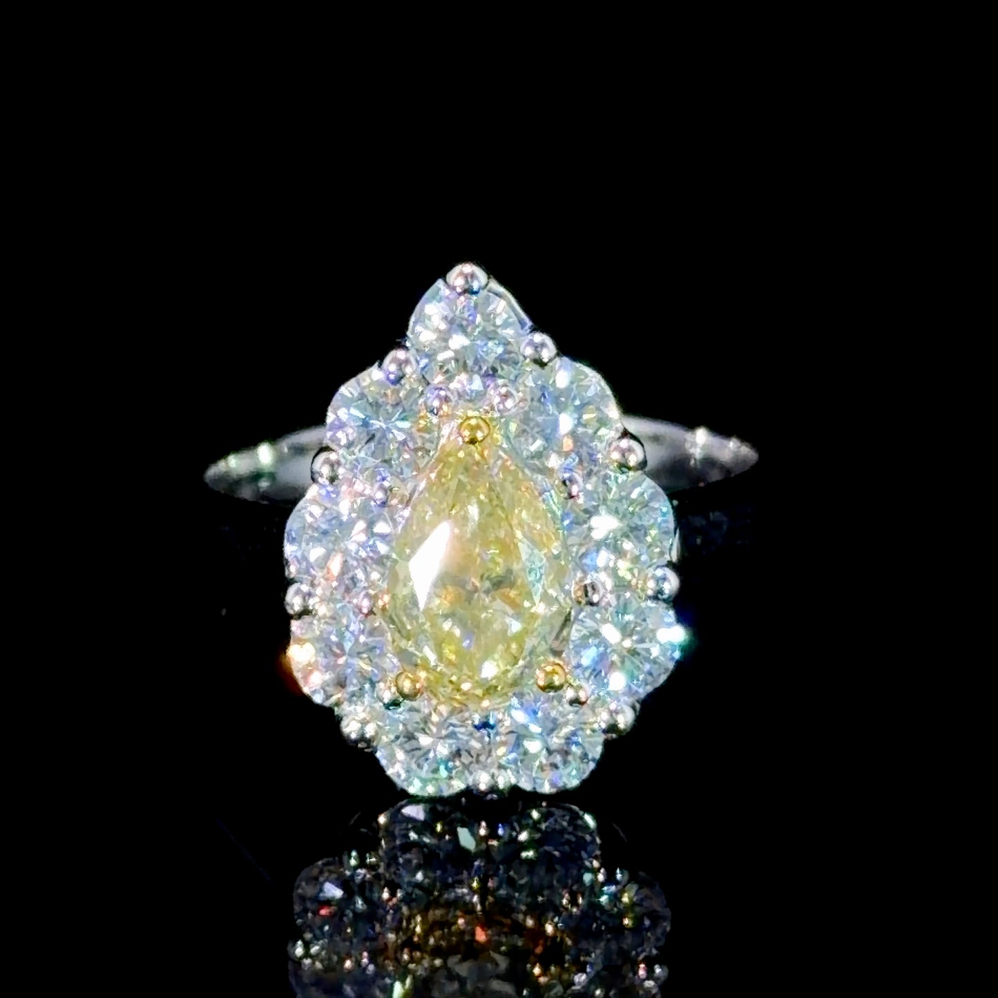 A Stunning Platinum Yellow Diamond Pear Halo Ring 1.05 Ct Center 2.15 Cts Total