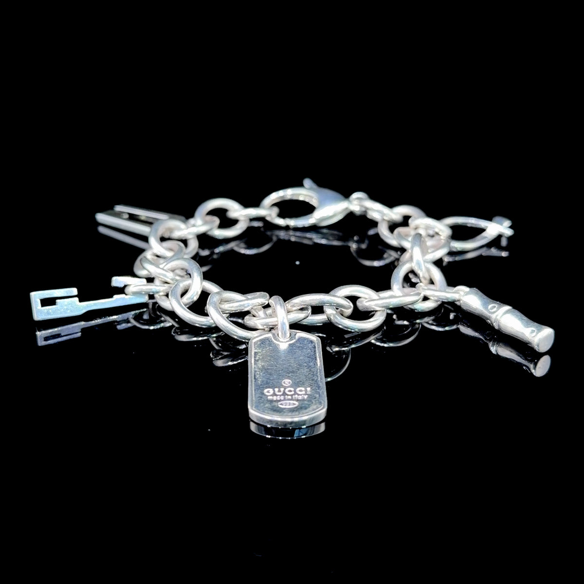 Lovely Gucci Logo Charm Bracelet 71/2” Long
