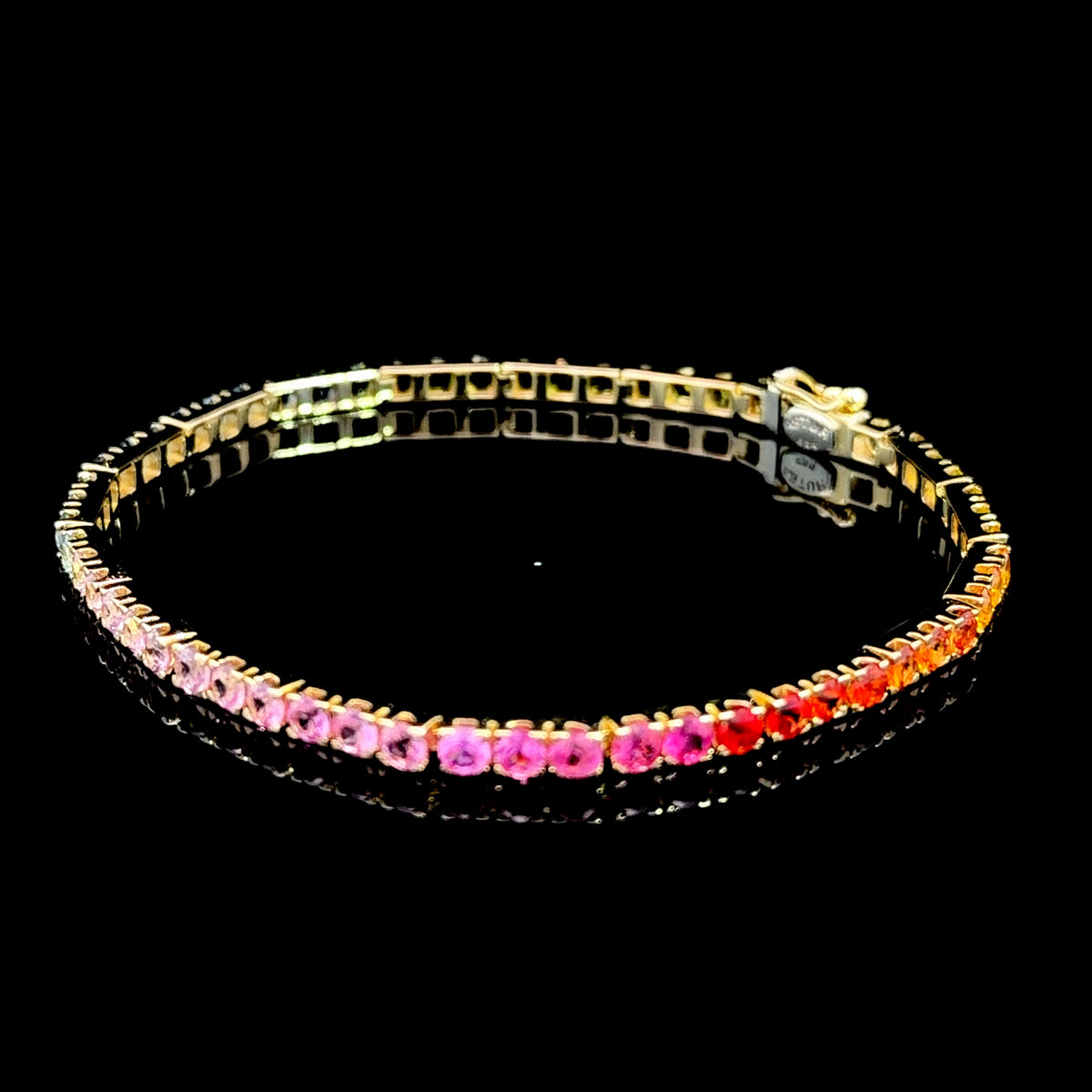 A Lovely 14k Yellow Gold Rainbow Sapphire Tennis Bracelet Having The full Range Of Colours & 7.4Cts 7.5 Inches Long