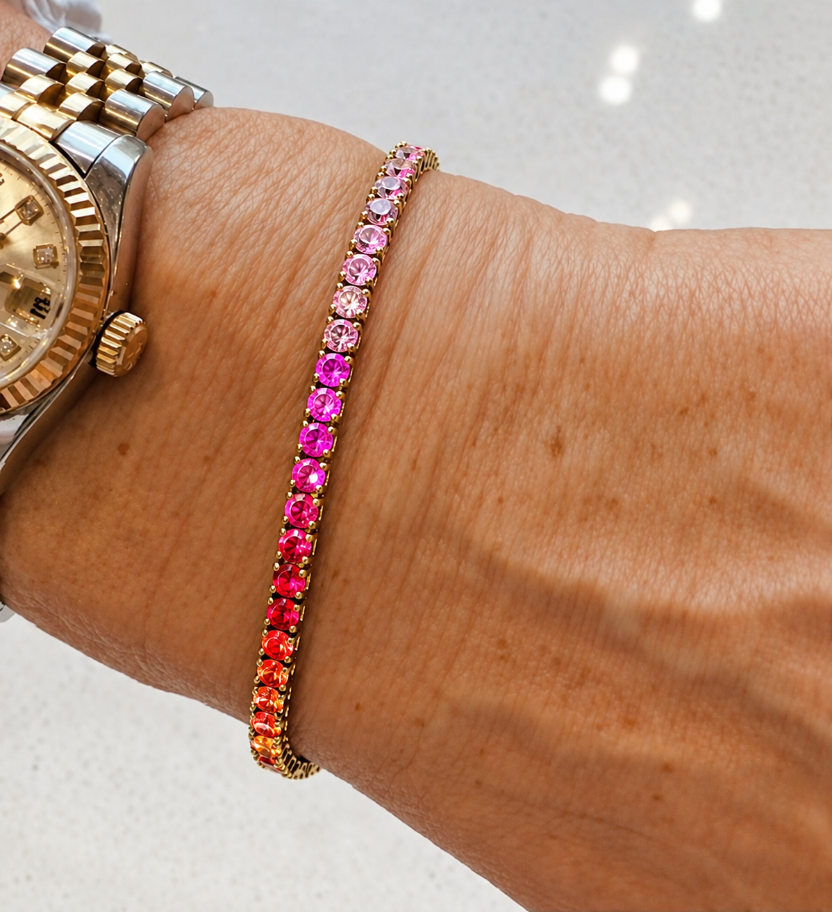 A Lovely 14k Yellow Gold Rainbow Sapphire Tennis Bracelet Having The full Range Of Colours & 7.4Cts 7.5 Inches Long