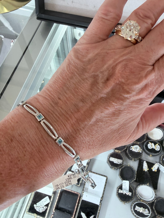 9K White Gold Blue Topaz Bracelet