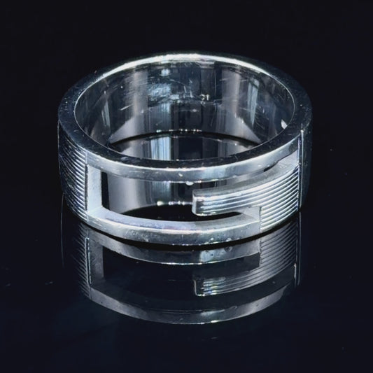A Sterling Silver G Ring Featuring A Ribbed Finish By Gucci