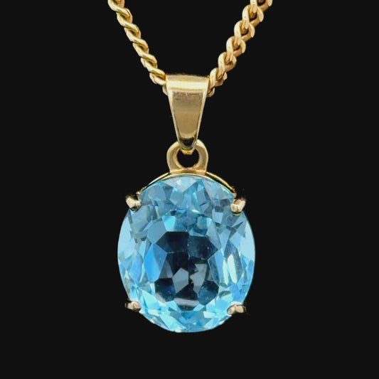 9k Yellow Gold Oval Blue Topaz Pendant