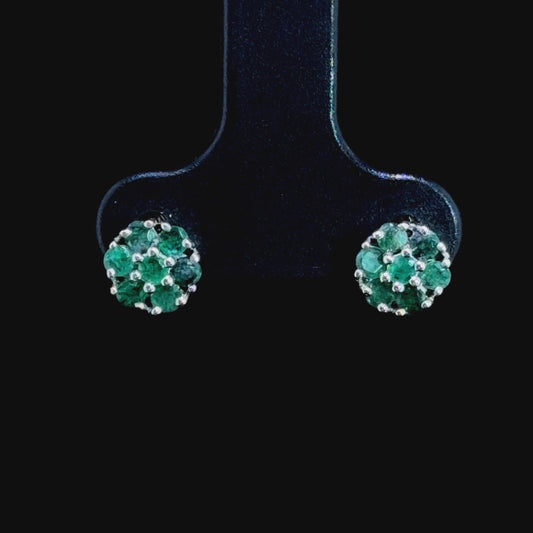 A Sweet Pair Of 9k White Gold Emerald Daisy Stud Earrings