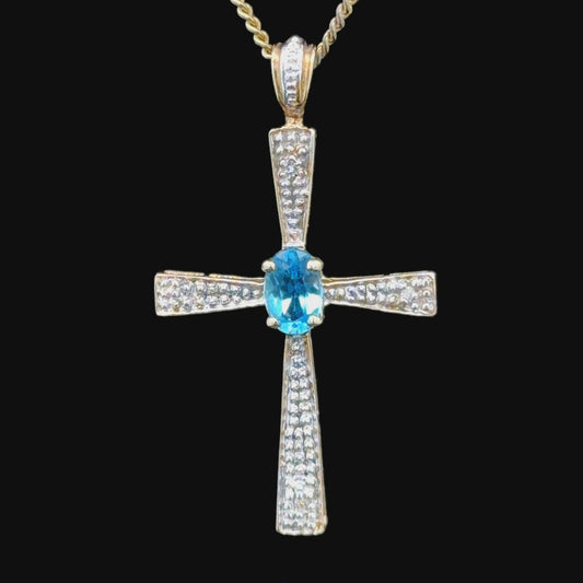 9k Oval Blue Topaz and Pave Diamond Yellow Gold Cross Pendant