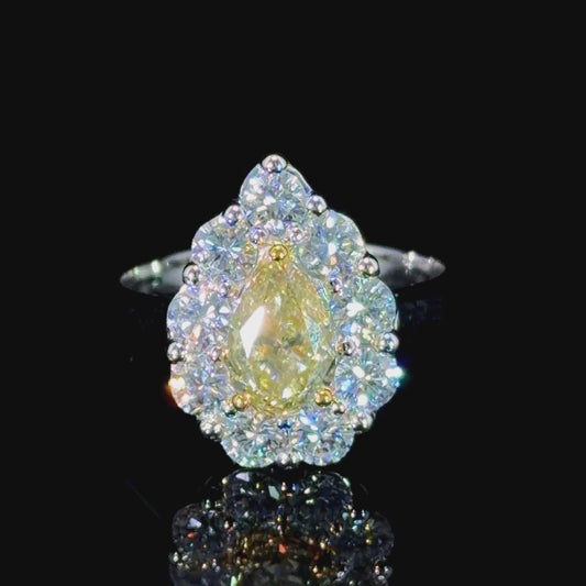 A Stunning Platinum Yellow Diamond Pear Halo Ring 1.05 Ct Center 2.15 Cts Total