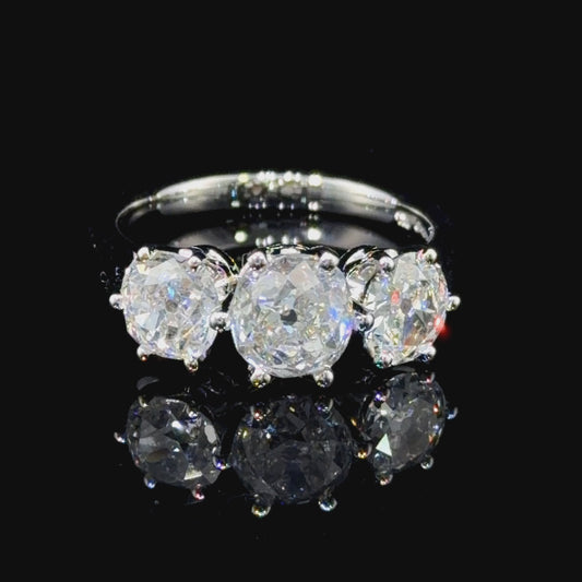 A Spectacular Platinum & Old Cut Diamond Trilogy Ring of 2.7 Cts