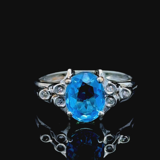 9K White Gold Blue Topaz & Diamond Ring